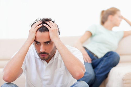 Photo of upset couple with marital problems